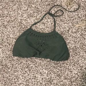 Halter swim top by Malibu. Has cups for support